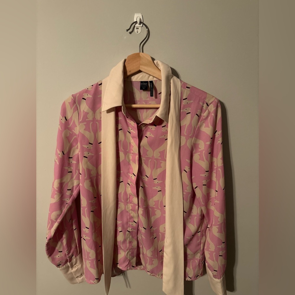 Icone long sleeve button up blouse with dog pattern and neck tie feature